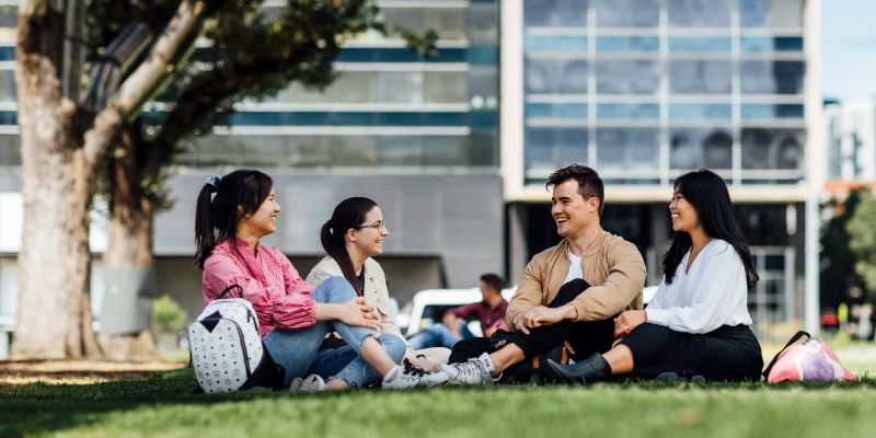 JD students in park outside law school