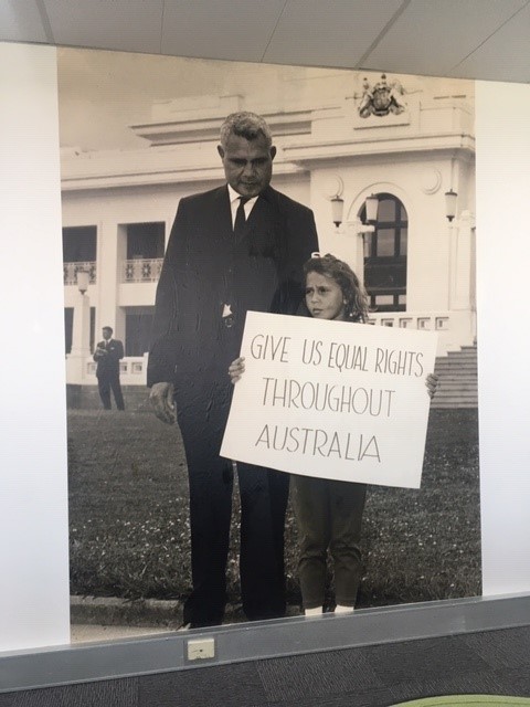 Boxer Jack Hudson with daughter outside Parliament House prior to 1967 Referendum