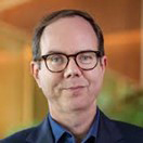 Associate Professor John Minas