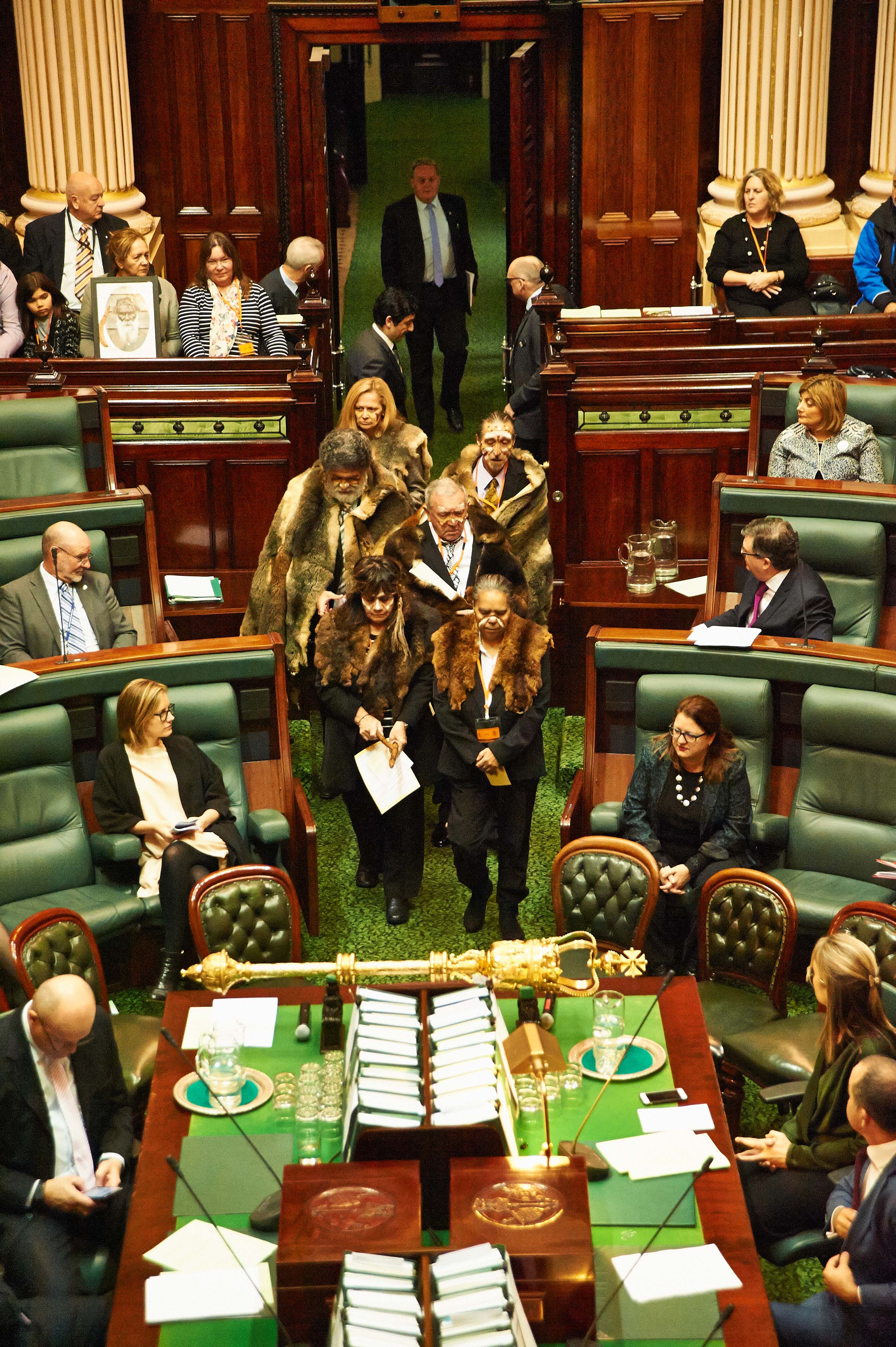 Wurundjeri Elders enter the Victorian Legislative Assembly to address the house in support of the Wilip-Gin Birrarung Murron Bill July 2017