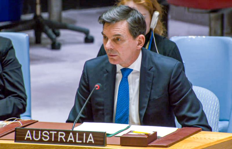 A close-up of James Larsen seated in Security Council, with the 